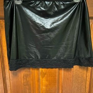 Pre-loved vinyl slip with lace trim. By Darque Size L. Very cute!